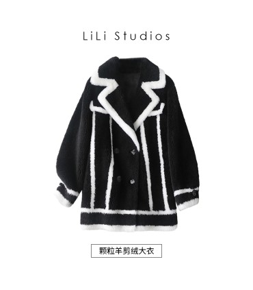 Kort dik pak van schapenvacht