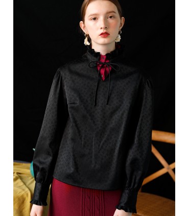 Blouse van brokaat met donkere kanten mouwen