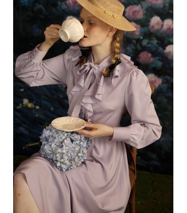 Paarse glinsterende jurk met ruches 