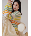 Suéter de textura suelta que cura el color 