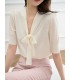 Top in maglia con colletto flottante in lana