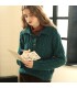 Pull en laine à col polo et boucle en corne de veau torsadé