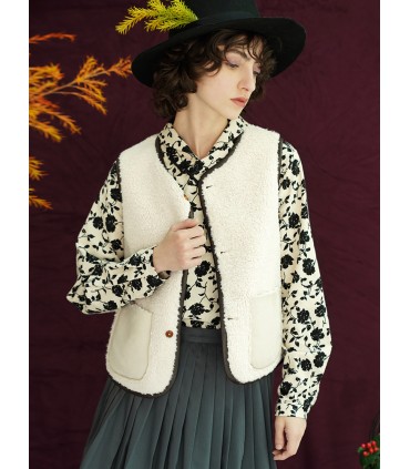 Pälssömmar i ett stycke dubbelsidig bärbar lammväst