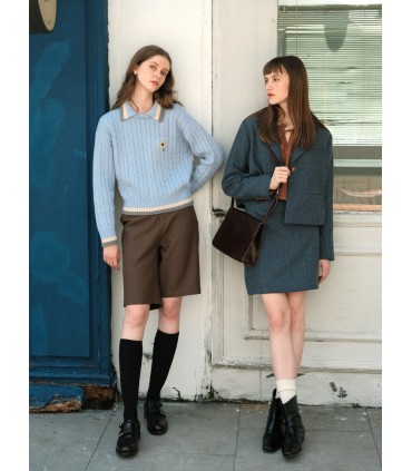 Pull en laine torsadée brodé marguerite 