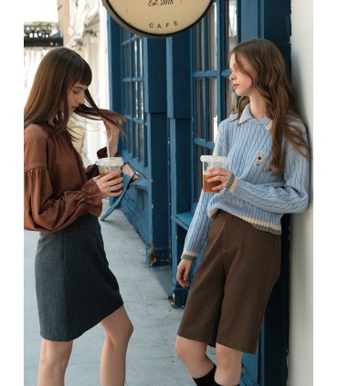 Pull en laine torsadée brodé marguerite 