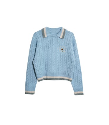 Pull en laine torsadée brodé marguerite 