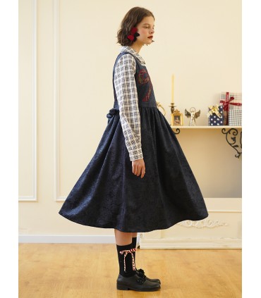 Marineblauwe mouwloze halflange rok met geborduurd strikje 